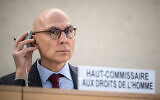 United Nations High Commissioner for Human Rights Volker Turk listens to delegates after delivering his report of the situation in the West Bank and Gaza during the 55th session of the UN Human Rights Council in Geneva on February 29, 2024. (Fabrice Coffrini/AFP)