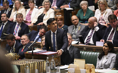 In this handout photo provided by UK Parliament, Britain's Prime Minister Rishi Sunak speaks during Prime Minister's Questions in the House of Commons in London, Wednesday, September 13, 2023. (Maria Unger/UK Parliament via AP)