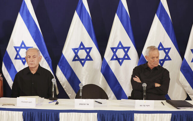 Prime Minister Benjamin Netanyahu (left) and war cabinet minister Benny Gantz at a press conference in the Kirya military base in Tel Aviv, October 28, 2023. (Abir Sultan/Pool Photo via AP)