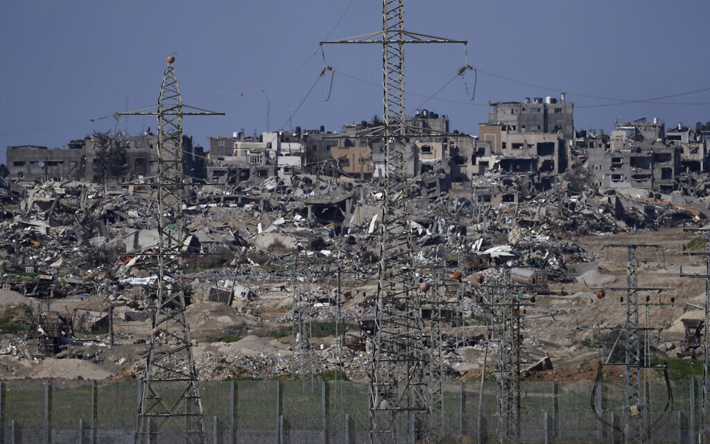 Rubble from buildings destroyed in the Gaza Strip are seen from southern Israel, Thursday, Feb. 1, 2024. (AP/Tsafrir Abayov)