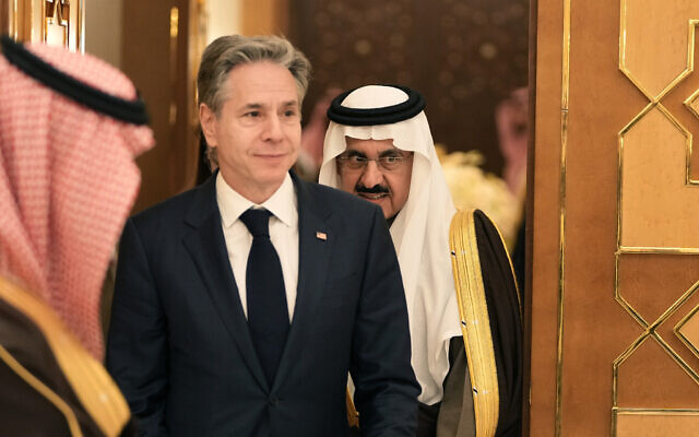 US Secretary of State Antony Blinken leaves with Saudi Arabia's Minister of State and National Security Musaed Al Aiban, right, after a meeting with Saudi Arabia's Crown Prince Mohammed bin Salman, in Riyadh, Saudi Arabia, February 5, 2024. (Mark Schiefelbein/AP)