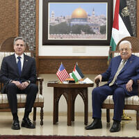 US Secretary of State Antony Blinken, left, and Palestinian President Mahmoud Abbas meet in the West Bank town of Ramallah, February 7, 2024. (AP Photo/Mark Schiefelbein, Pool)