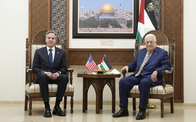 US Secretary of State Antony Blinken, left, and Palestinian President Mahmoud Abbas meet in the West Bank town of Ramallah, February 7, 2024. (AP Photo/Mark Schiefelbein, Pool)