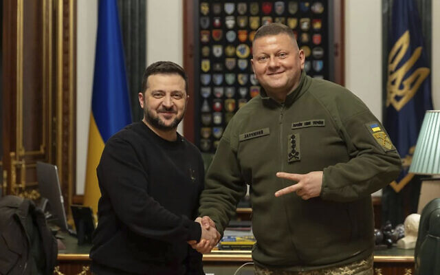 In this photo provided by the Ukrainian Presidential Press Office, Ukrainian President Volodymyr Zelensky, left, shake hand with Commander-in-Chief of Ukraine's Armed Forces Valerii Zaluzhnyi during their meeting in Kyiv, Ukraine, February 8, 2024. (Ukrainian Presidential Press Office via AP)