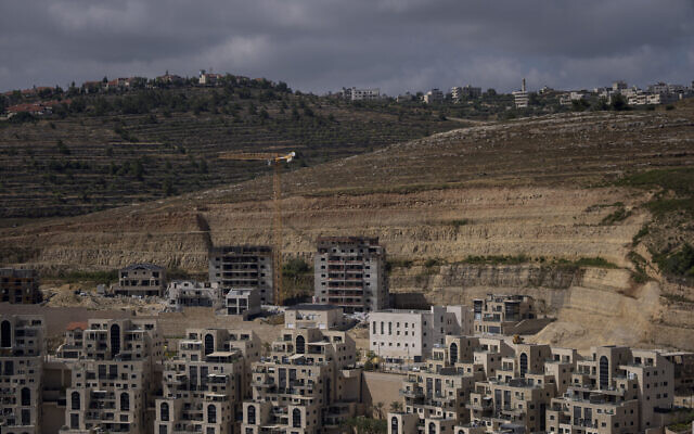 File: This photo shows a construction site of new housing projects in the West Bank settlement of Givat Ze'ev, June 18, 2023 (AP Photo/Ohad Zwigenberg, File)