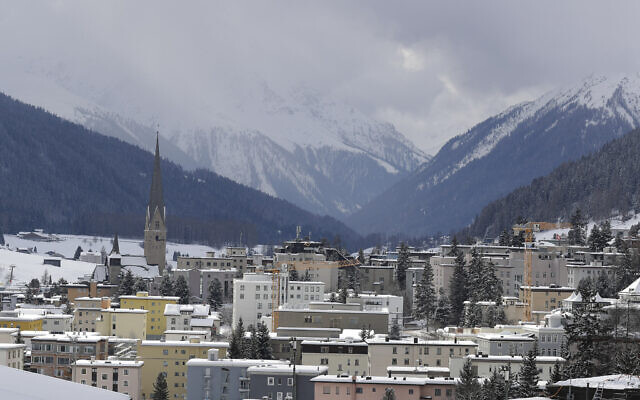 Snow covers the hills around Davos, Switzerland, on January 19, 2020. (AP Photo/ Markus Schreiber, File)