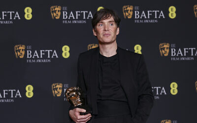 Cillian Murphy, winner of the leading actor award for 'Oppenheimer,' poses for photographers at the 77th British Academy Film Awards, BAFTA's, in London, Sunday, Feb. 18, 2024. (Vianney Le Caer/Invision/AP)