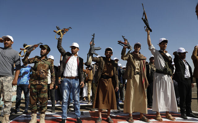 Newly recruited Houthi fighters attend a protest march against the US-led strikes on Yemen and the Israeli war in the Gaza Strip, February 21, 2024, in Sanaa, Yemen. (AP Photo/Osamah Abdulrahman)