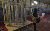 File: A student looks at Iran's domestically built centrifuges in an exhibition of the country's nuclear achievements, in Tehran, Iran, February 8, 2023. (AP Photo/Vahid Salemi)