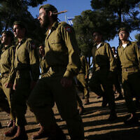 Ultra-Orthodox soldiers attend a swearing-in ceremony as they enter the IDF 'Nahal Haredi' unit, at Ammunition Hill in Jerusalem on May 26, 2012. (Miriam Alster/Flash90)