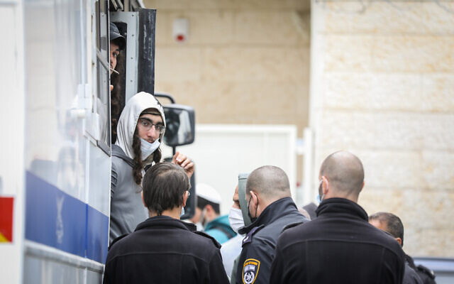 File - David Chai Chasdai arrives for a court hearing outside the Magistrate's Court in Jerusalem on February 16, 2022. (Noam Revkin Fenton/Flash90)