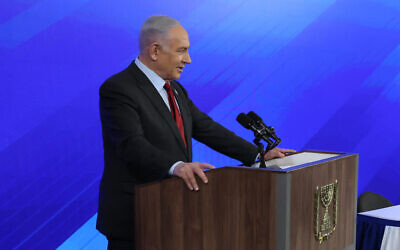 Prime Minister Benjamin Netanyahu speaks during a press conference at the Ministry of Defense in Tel Aviv on January 18, 2024. (Tomer Appelbaum/POOL)
