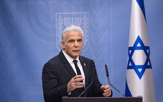 Opposition leader and head of the Yesh Atid party Yair Lapid leads a faction meeting at the Knesset in Jerusalem (Photo by Yonatan Sindel/Flash90)