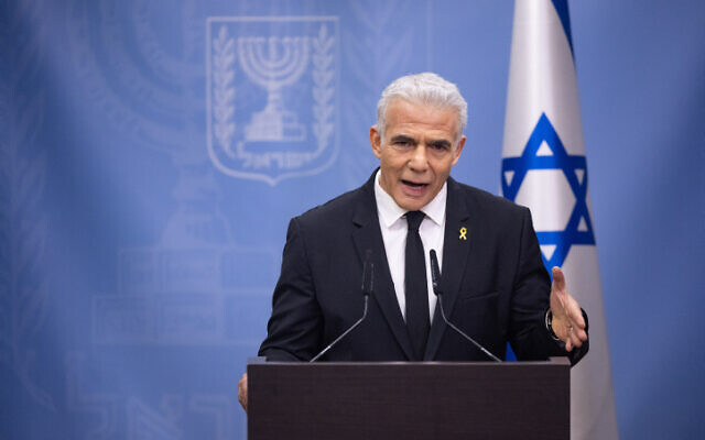Opposition Leader Yair Lapid leads a faction meeting of his Yesh Atid party at the Knesset on February 5, 2024 (Yonatan Sindel/Flash90)
