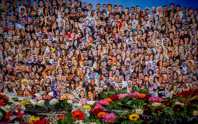 Pictures of Israelis who were murdered by Hamas terrorists at the Nova festival, outside the Knesset in Jerusalem on February 7, 2024.  (Yonatan Sindel/Flash90)