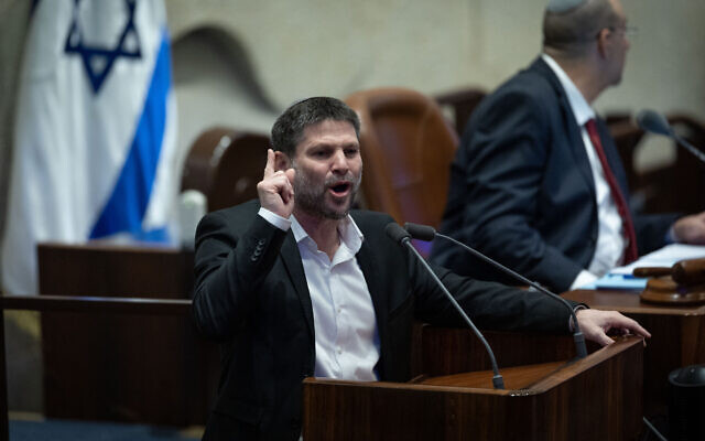 Finance Minister Bezalel Smotrich speaks during the first reading of the amended 2024 wartime budget, at the Knesset in Jerusalem on February 7, 2024. (Yonatan Sindel/Flash90)