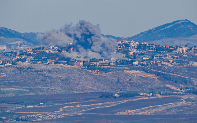 Smoke rises after an Israeli air strike in southern Lebanon, as seen from the Israeli side of the border, February 8, 2024. (Ayal Margolin/Flash90)