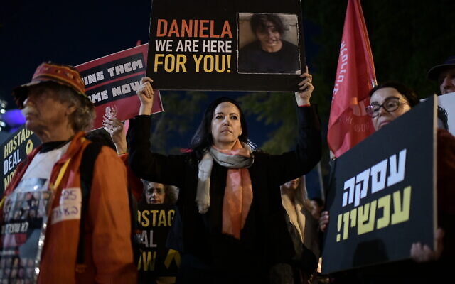 Israelis attend a rally calling for the release of Israelis held kidnapped by Hamas terrorists in Gaza outside the Defense Ministry Headquarters in Tel Aviv, February 8, 2024.