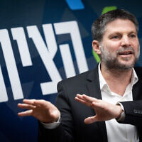 Minister of Finance and Religious Zionist party chairman Bezalel Smotrich leads a faction meeting at the Knesset, February 12, 2024. (Yonatan Sindel/Flash90)