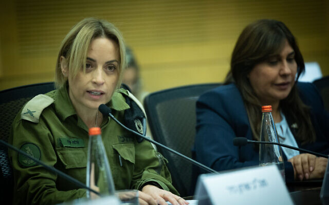 Brig. Gen. Ella Shedo Shechtman, the IDF's gender affairs adviser, speaks at a Knesset conference on women's heroism on February 13, 2024. (Yonatan Sindel/Flash90)