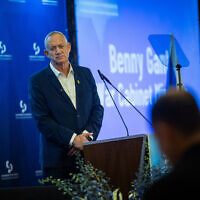 War cabinet minister Benny Gantz speaks at the Conference of Presidents of Major American Jewish Organizations in Jerusalem on February 18, 2024 (Photo by Yonatan Sindel/Flash90)