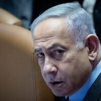 Prime Minister Benjamin Netanyahu attends a Knesset plenum session on February 19, 2024. (Yonatan Sindel/Flash90)