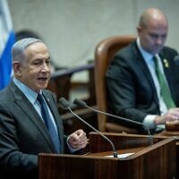 Prime Minister Benjamin Netanyahu speaks during a plenum session at the Knesset on February 19, 2024. (Yonatan Sindel/Flash90)