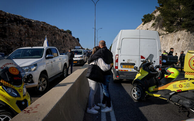 People at the scene of a terror shooting attack outside of Ma'aleh Adumim in the West Bank. February 22, 2024. ( Chaim Goldberg/FLASH90)