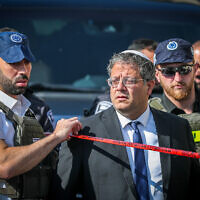 National Security Minister Itamar Ben Gvir at the scene of a terror shooting attack on Route 1 near Ma'ale Adumim, in the West Bank, February 22, 2024. (Jamal Awad/Flash90)