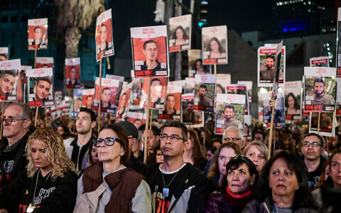 Israelis attend a rally calling for the release of Israelis held kidnapped by Hamas terrorists in Gaza at 'Hostages Square' in Tel Aviv, February 24, 2024. (Avshalom Sassoni/ Flash90)