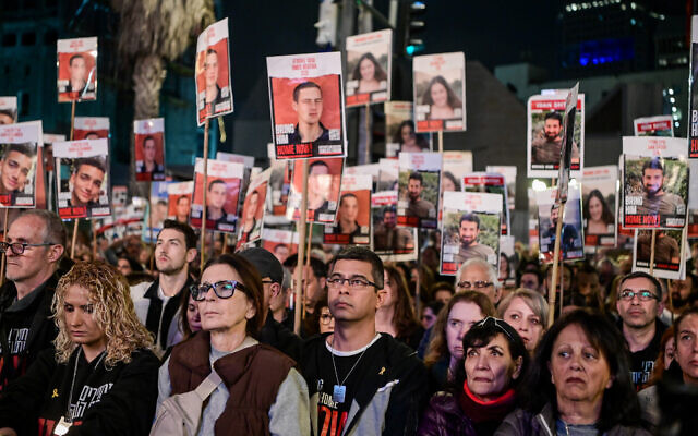 Israelis attend a rally calling for the release of Israelis held kidnapped by Hamas terrorists in Gaza at "Hostages Square" in Tel Aviv, February 24, 2024. (Avshalom Sassoni/Flash90)