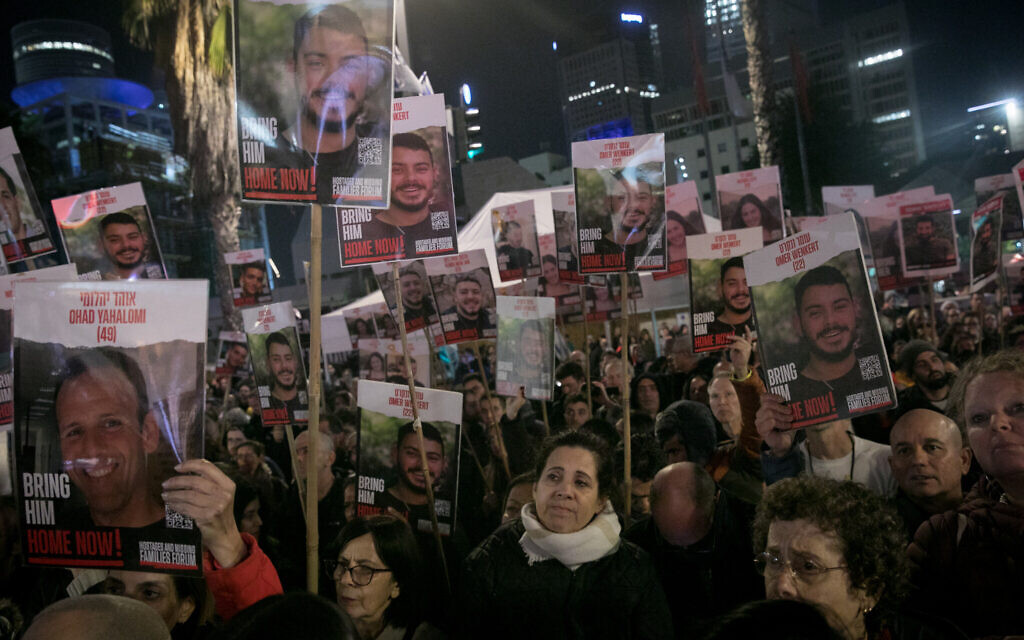 Israelis attend a rally calling for the release of Israelis kidnapped and held by Hamas terrorists in Gaza, at Hostages Square in Tel Aviv, February 3, 2024. (Miriam Alster/ Flash90)