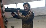Takeshi Ebisawa with a rocket launcher. (US District Court for the Southern District of New York)