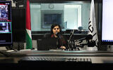 Palestinian radio presenter Maysam Barghouti sits at Radio Ajyal, a station based in Ramallah, Feb. 9, 2024. (Zain Jaafar/AFP)