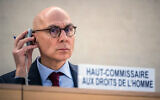 United Nations High Commissioner for Human Rights Volker Turk listens to delegates after delivering his report of the situation in the West Bank and Gaza during the 55th session of the UN Human Rights Council in Geneva on February 29, 2024. (Fabrice Coffrini/AFP)