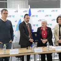 Health officials at the announcement of the 2024 health basket recommendations. The center three are (left to right): Health Ministry Director-General Moshe Bar Siman Tov, Health Minister Uriel Busso, and health basket committee chair Prof. Dina Ben-Yehuda, February 22, 2024. (Courtesy of Health Ministry)