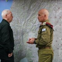 Defense Minister Yoav Gallant (left) speaks with IDF Northern Command chief Maj. Gen. Ori Gordin at the unit's HQ in Safed, February 25, 2024. (Ariel Hermoni/Defense Ministry)