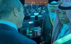 Economy Minister Nir Barkat (left) meets with Saudi Commerce Minister Majid bin Abdullah Al-Qasabi at the WTO conference in Abu Dhabi, February 26, 2024. (Courtesy Economy Ministry)