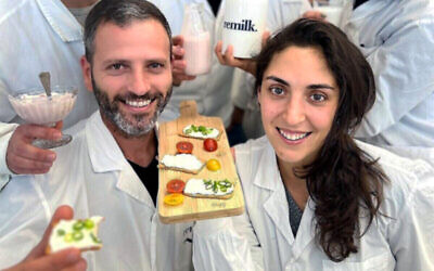 Scientists at Israeli food tech startup Remilk present dairy products made with its cow-free milk protein. (Courtesy)