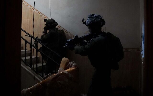 Troops operate in Gaza, in a handout image cleared for publication by the IDF on February 19, 2024. (Israel Defense Forces)