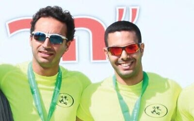 Eliav Cohen-Tsemah (left) and Itay Yehoshua were friends who ran together; Yehoshua was killed in battle on October 7, 2023. Cohen-Tsemah is dedicating his 100th marathon, the 13th Jerusalem Marathon on March 8, 2024, to Yehoshua's memory (Courtesy)