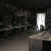 Memorial candles line the charred desks in the destroyed command center of the Nahal Oz base, February 23, 2024. (Used in accordance with Clause 27a of the Copyright Law)