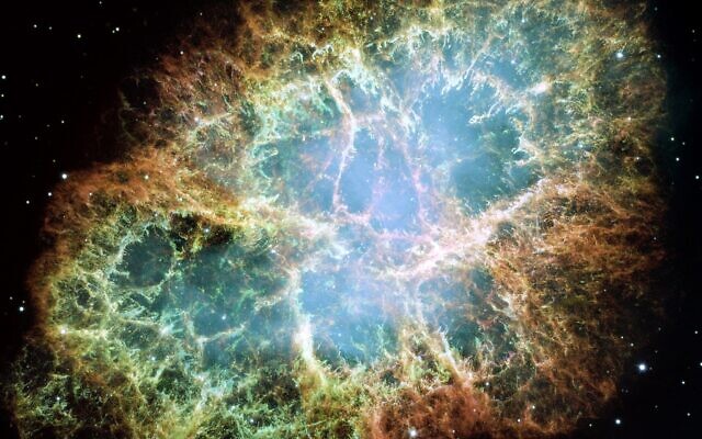 A mosaic image, one of the largest ever taken by NASA's Hubble Space Telescope, of the Crab Nebula, a six-light-year-wide expanding remnant of a star's supernova explosion. (NASA, ESA, J. Hester and A. Loll (Arizona State University) - HubbleSite: gallery, release. Public domain)