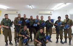 IDF soldiers pose with gear provided to them by Soldiers Save Lives. (Soldiers Save Lives)