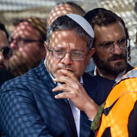 National Security Minister Itamar Ben Gvir attends the funeral of Rabbi Yitzhak Zeiger, who was killed in a terror attack near Eli, in Jerusalem, March 1, 2024. (Yonatan Sindel/Flash90)