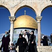 People walk in front of the Dome of the Rock at the Temple Mount compound, in the Old City of Jerusalem on January 7, 2024. (Alberto PIZZOLI / AFP)