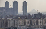 A view of the skyline of Cairo from the promontory of the Cairo Citadel on February 19, 2024. (Amir MAKAR / AFP)