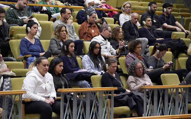 Former hostages and families of hostages held in Gaza attend a United Nations Security Council meeting about the conflict in the Middle East at UN headquarters in New York on March 11, 2024. (TIMOTHY A. CLARY / AFP)