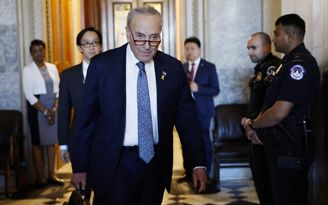 File - Senate Majority Leader Chuck Schumer (D-NY) departs from the Senate Chambers in the US Capitol Building on March 14, 2024 in Washington, DC. (Anna Moneymaker/Getty Images/AFP)