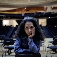 Israeli conductor Bar Avni poses during a photo session at the Philharmonie in Paris on March 18, 2024. (Stephane De Sakutin/AFP)